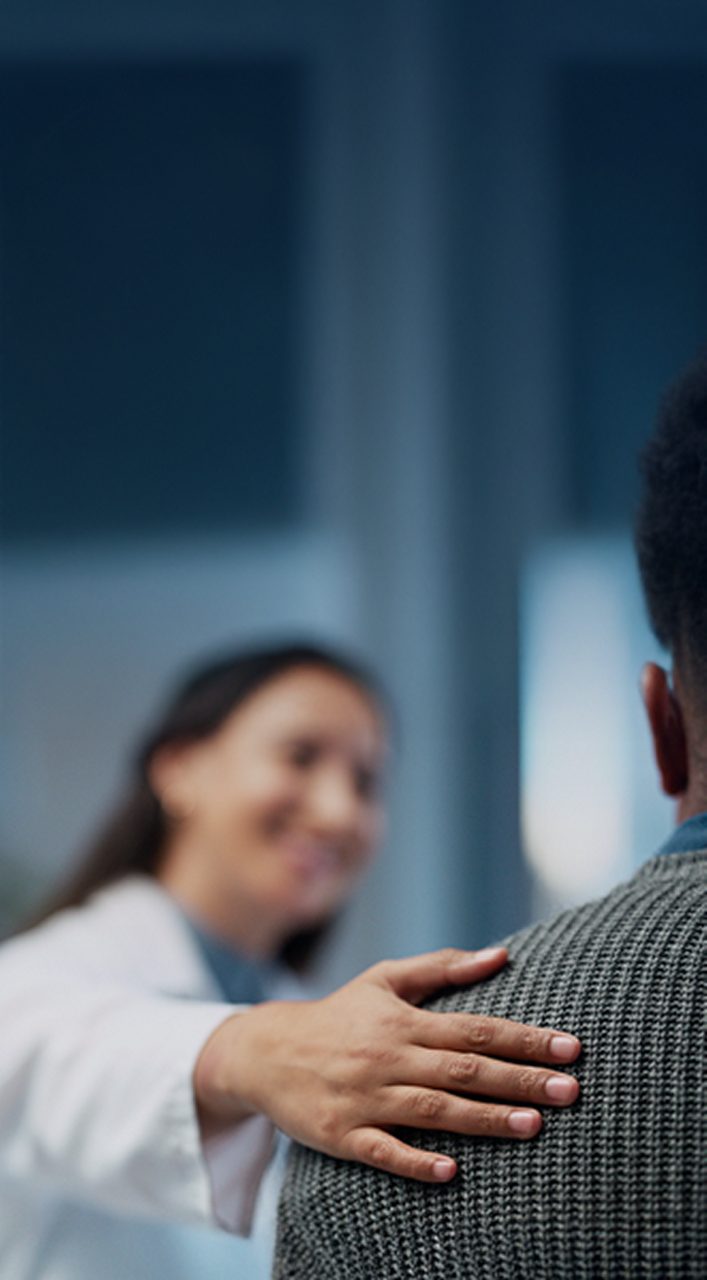  Woman spraying VEOZAH™ (fezolinetant) logo fire extinguisher at VMS fire