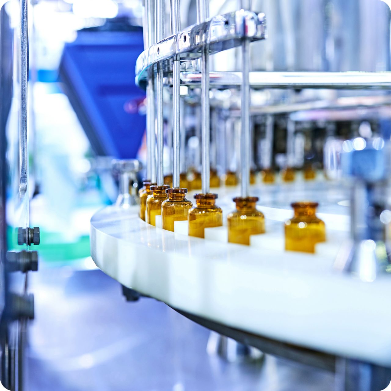 Vials being filled in an automated facility, showcasing Astellas’ global pharmaceutical manufacturing and product portfolio strength.