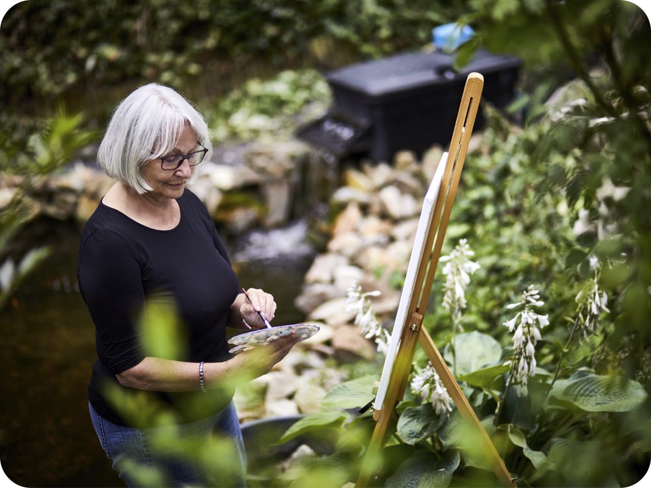 Image of a woman painting