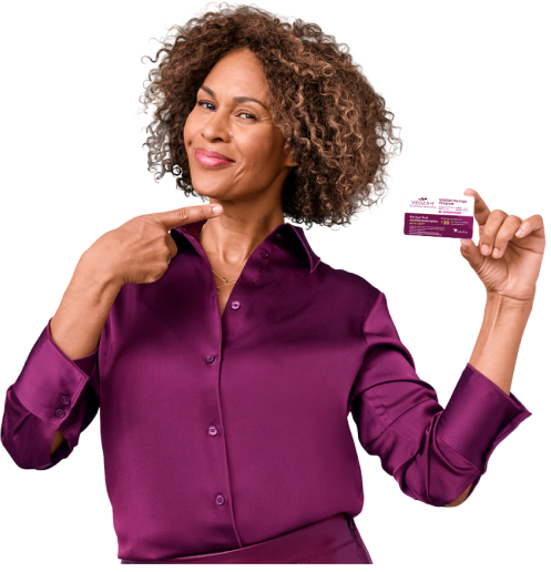 A lady holding a VEOZAH savings card