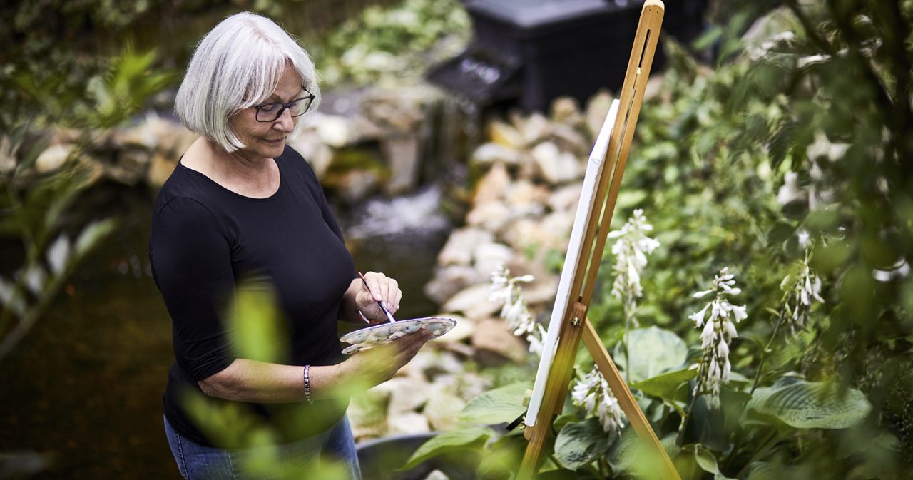Image of a woman painting