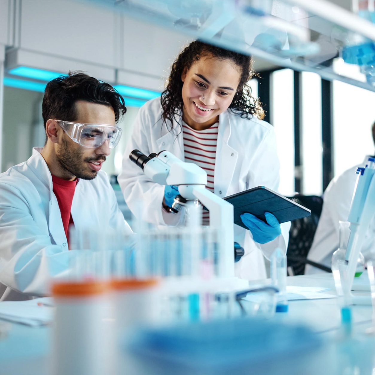 A group of healthcare professionals in discussion, highlighting Astellas’ commitment to collaborative, patient-focused care.